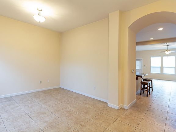 entry into open kitchen/living/dining