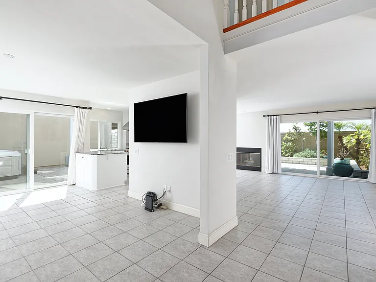 Family room with 65" TV.