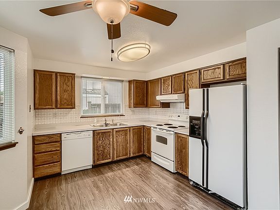 Enjoy the large kitchen with pantry space - all appliances stay! 