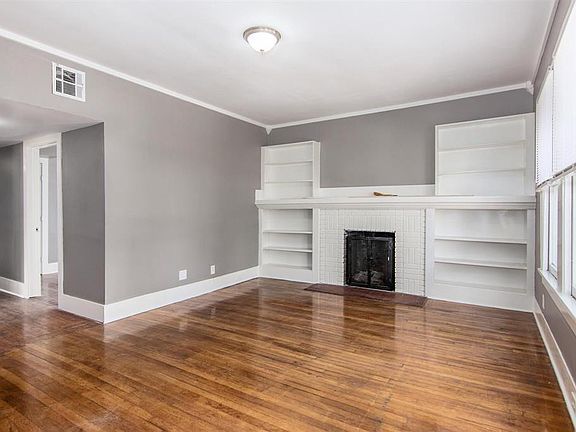 Unit 1 - Living Room and Bedroom 3 or Study on the right down the hall