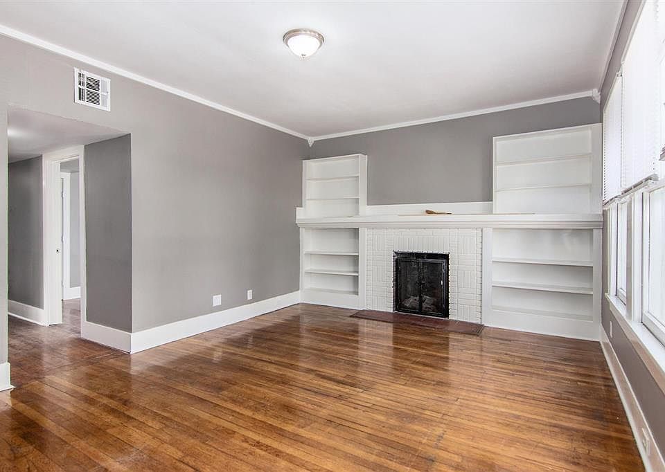 Unit 1 - Living Room and Bedroom 3 or Study on the right down the hall