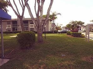 5th image of 471 NE 210th Cir Terrace #102-14