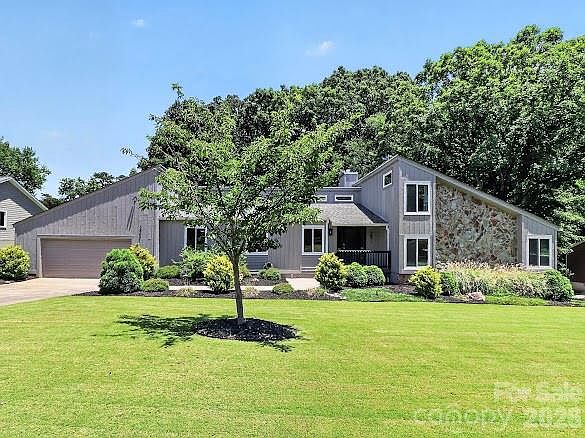 1st image of 8401 Raintree Ln