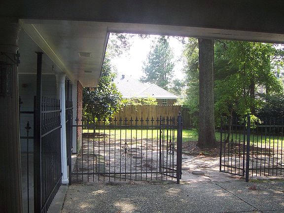 Covered patio and fenced back yard