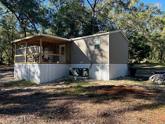 2nd image of 157 NW Lazy Acre Ct