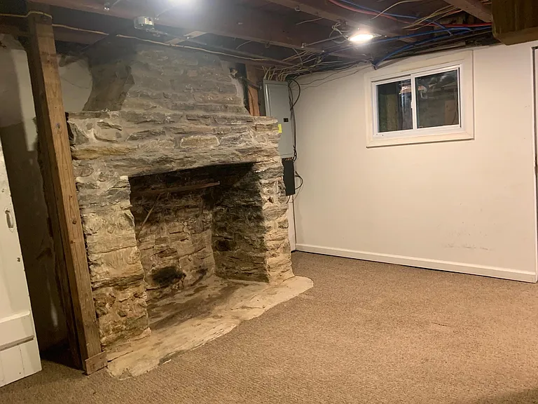Basement with historical chimney