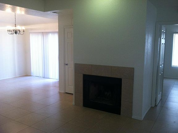 Living Room w/Fireplace to DiningRm