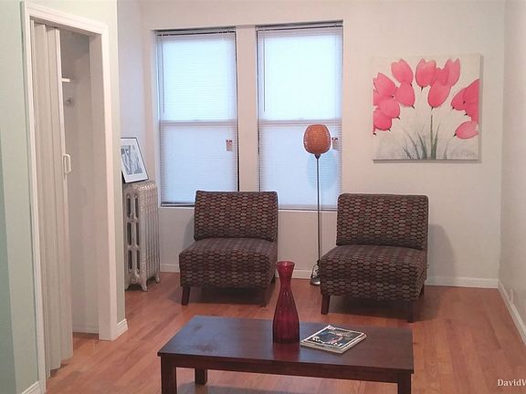 280 E 2nd St living room adj