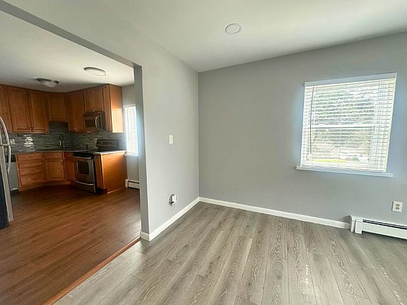 Sun filled kitchen and living room