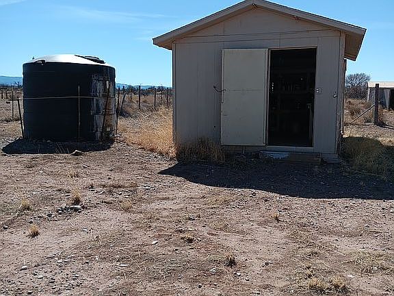 Home pump/tool shed with electricity