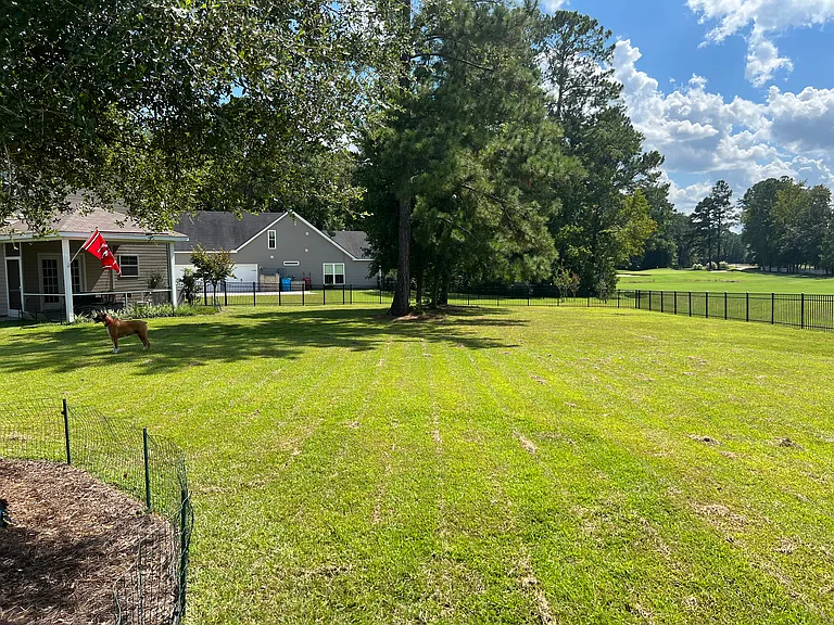 Backyard and 6th fairway of golf course.