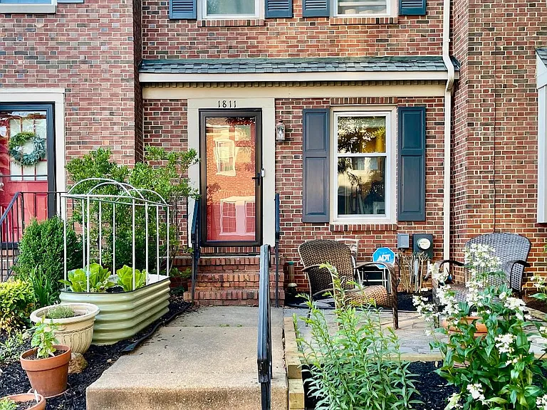 A gracious townhome in the heart of the triangle. Perfect blend of indoor and outdoor living.