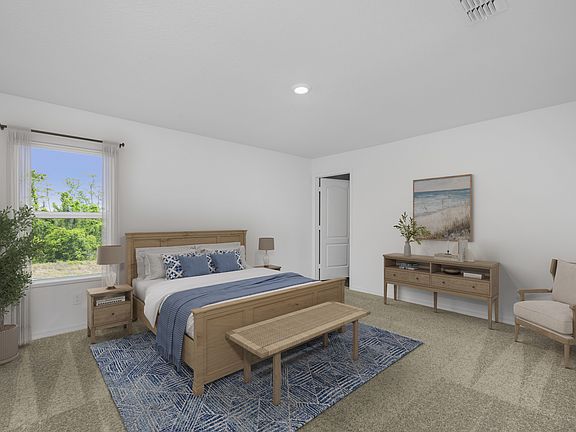 Rest and recharge in this peaceful master suite.