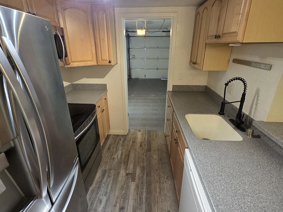 Kitchen leads to garage
