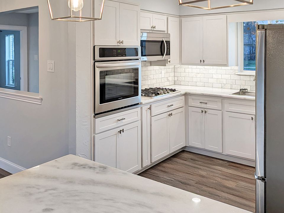 Kitchen island, with view of courtyard behind