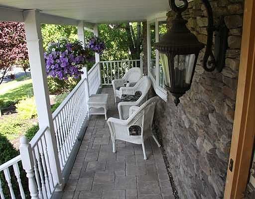 New front door, new stonework with paver floor.
