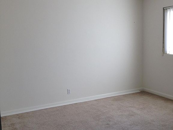 Bedroom with sliding closet doors