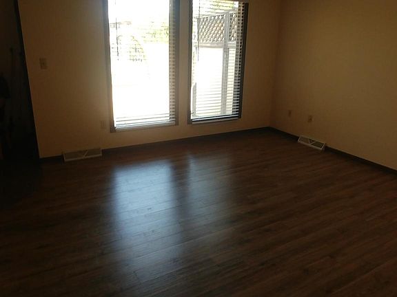 Upstairs Living Room with View out to Front Patio