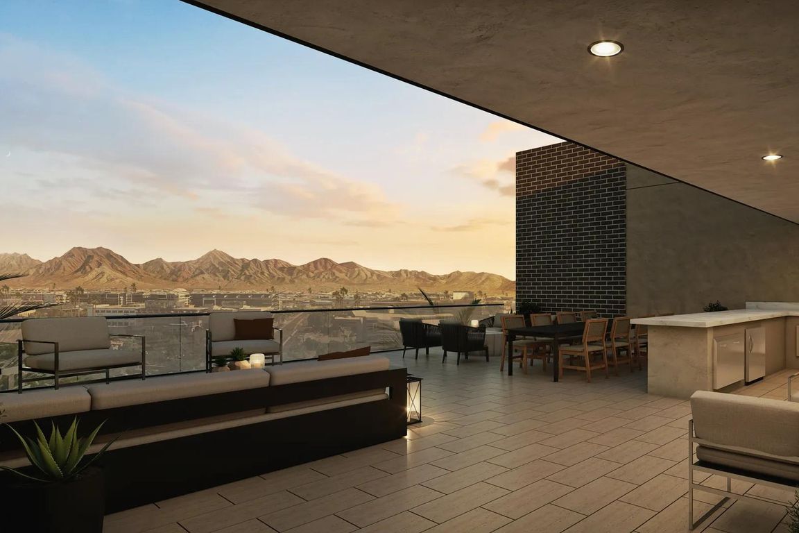 Rooftop deck with sweeping desert views.