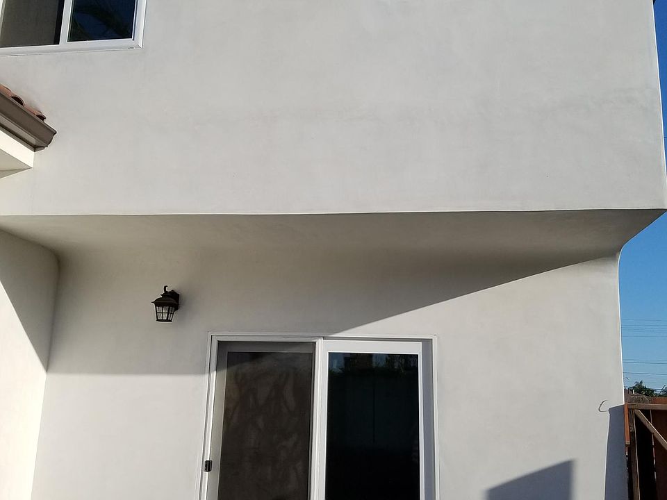 Private rear patio door entrance.