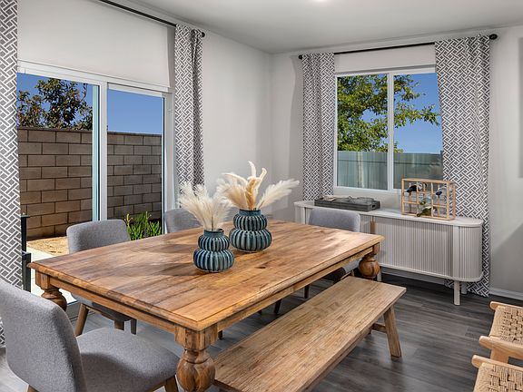 Dining room in the 3017 floorplan at a Meritage Homes community in Temecula, CA.