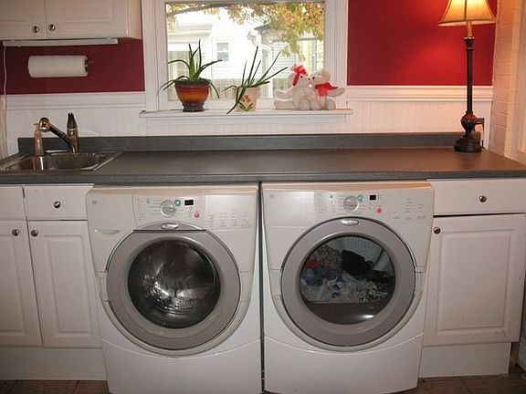 First Floor Mudroom/Laundry.  Powder Room Adjacent to This Space