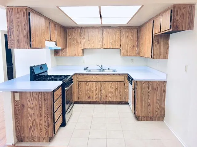 Kitchen will be fully renovated with white shaker cabinets and quarts countertops.