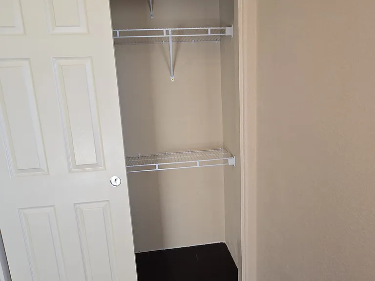 1st Guest bedroom second floor closet