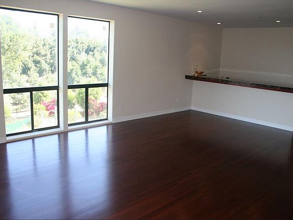 Living Room area, kitchenette on the right
