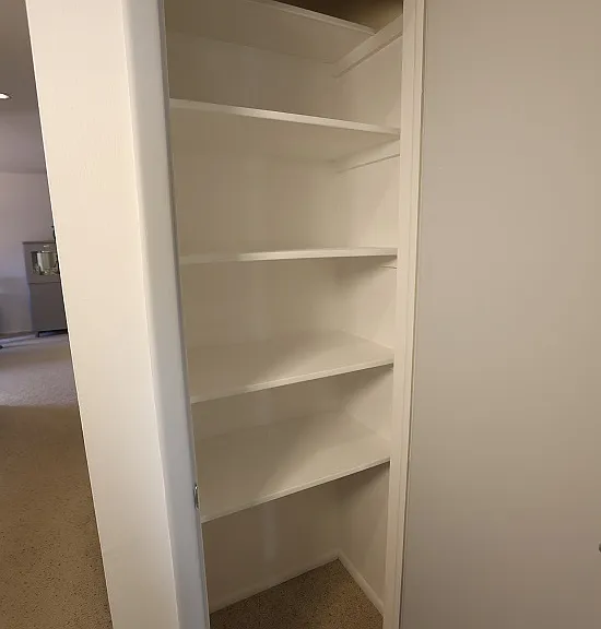 The 2nd closet in the hallway.