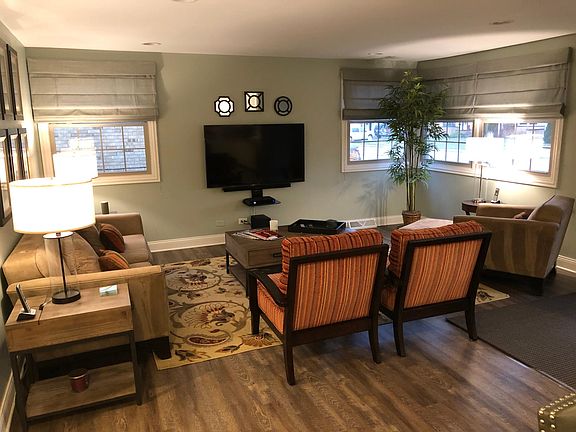 Living area is open to kitchen. Includes 55 inch TV with Cable