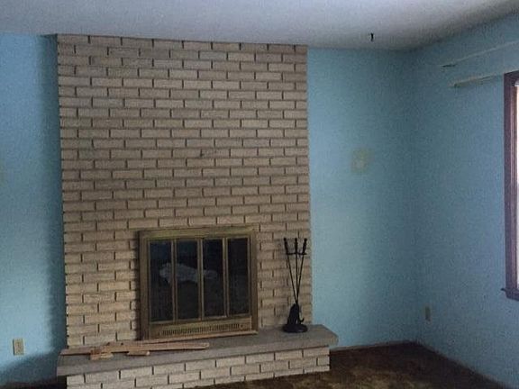 Living room in main level with fire place