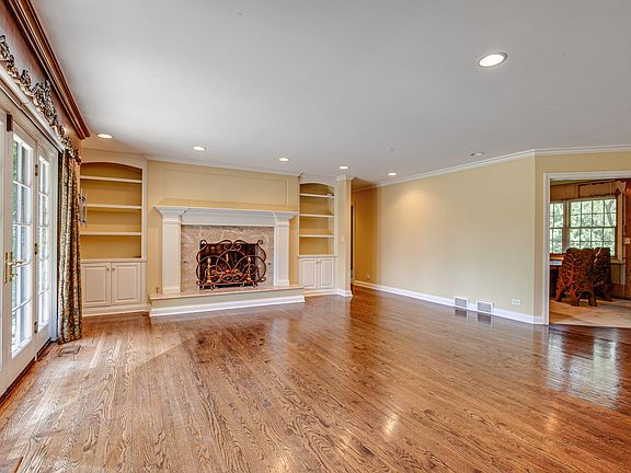 Gas fireplace with built-in shelving.