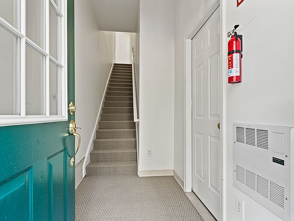 Lower lobby and stairs (storage room on right)