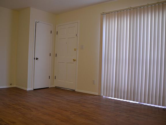 Natural light is complemented by ceiling lights and fans in 