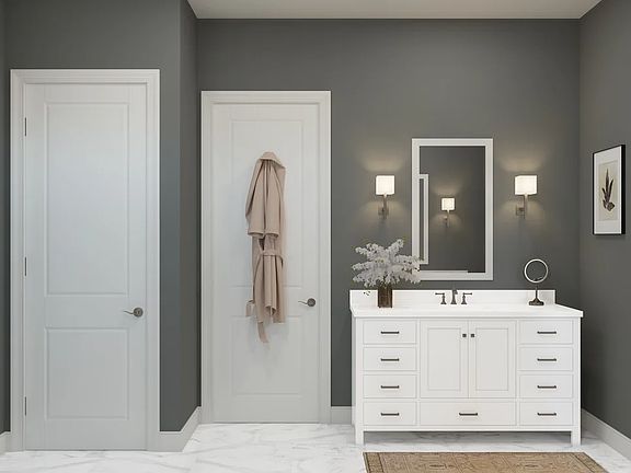 Primary bath with vanity and closet