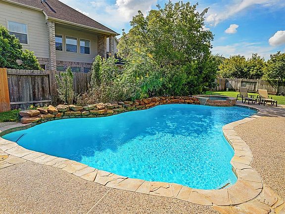 Sparkling Pool with a spa.
