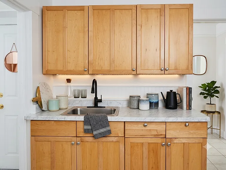 Kitchen with tons of storage (virtually staged).
