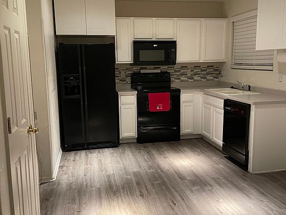 Updated kitchen with pantry and extra storage.