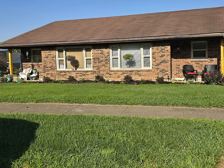 New landscaping in front with drip system. Room to plant your own plants - herbs and flowers (good full sun)! Yard mowing/care provided by landlord.