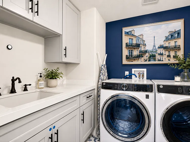 Laundry room. Location: downstairs