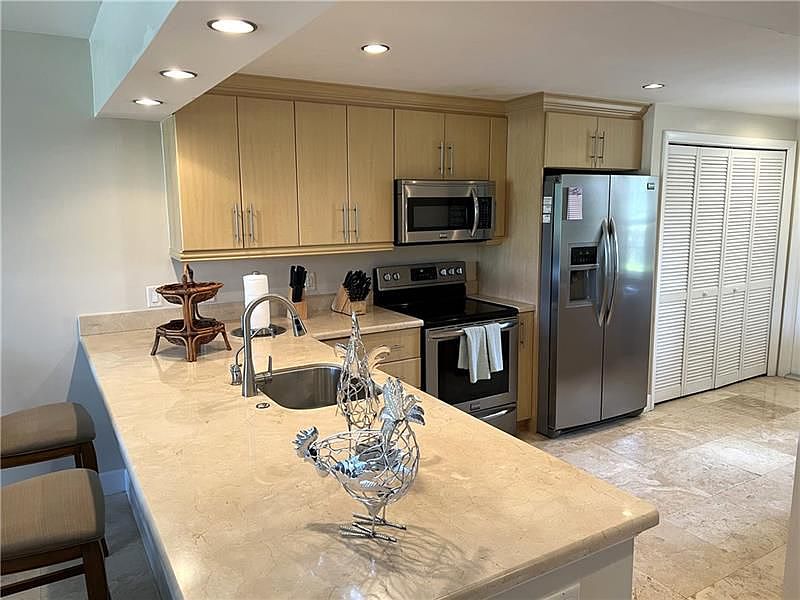 1st image of 2951 S Palm Aire Dr APT 102