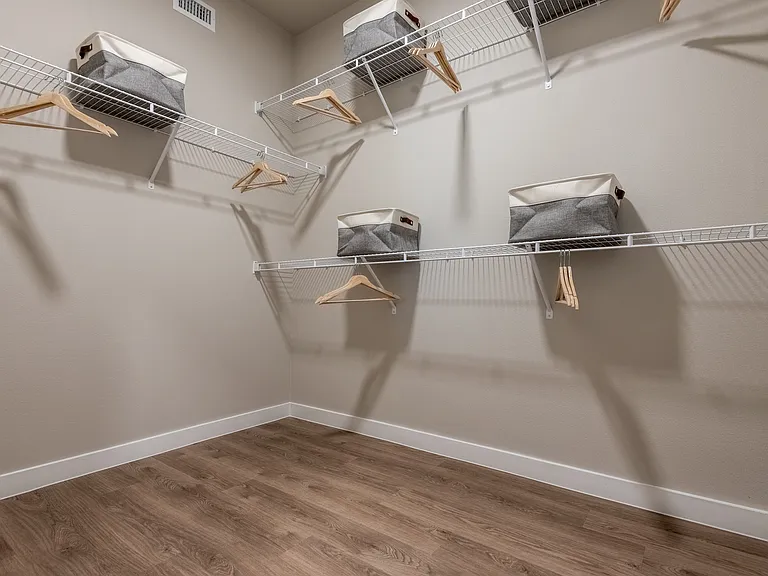 Spacious Walk-In Closet at The Hightone Apartments in Denton, TX