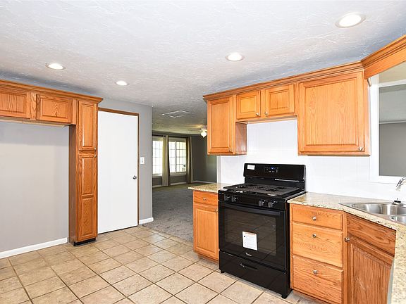 Kitchen. Bedroom, living & bonus room right of kitchen.