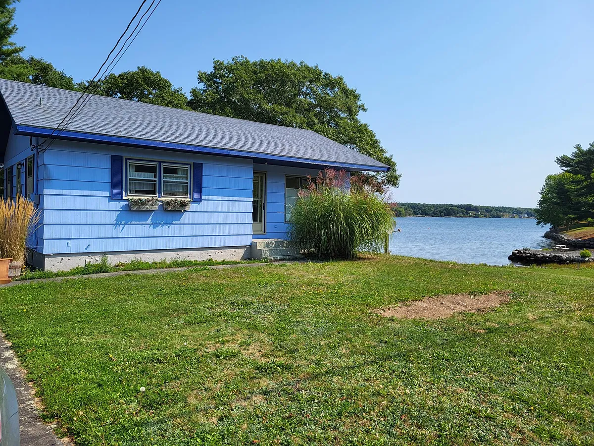 front of cottage with lahave river to the side of the property. Easy access for kayaking and other water sports. - 1915 Highway 331