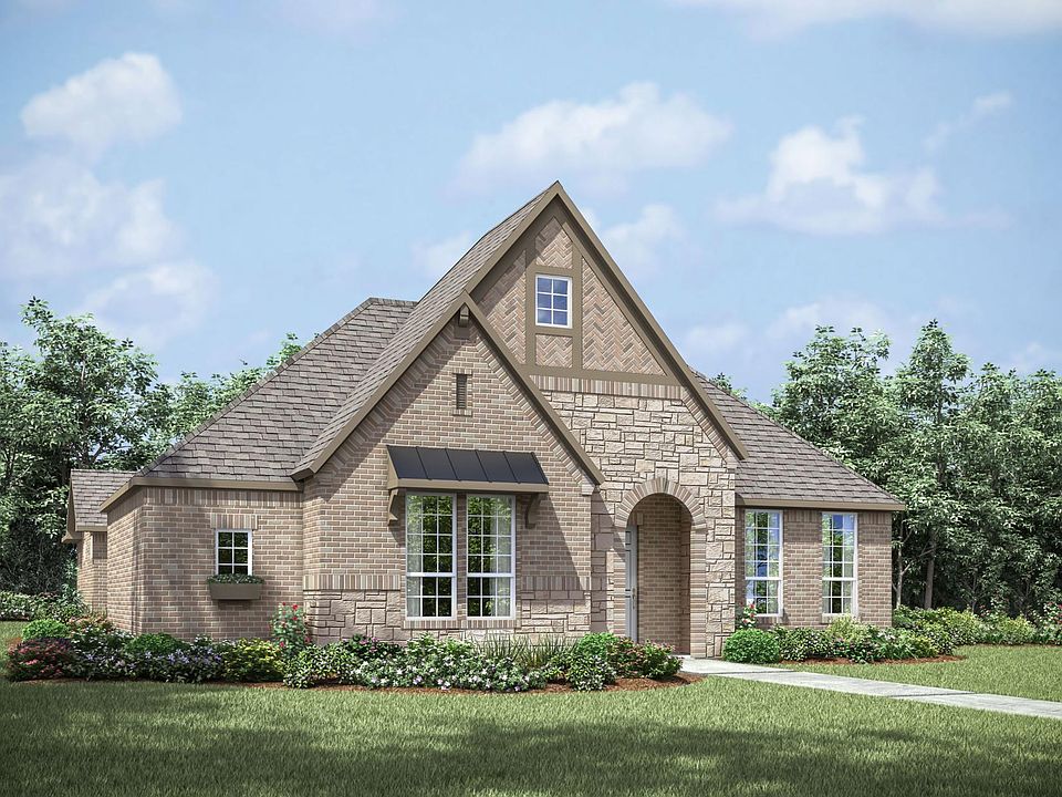 custom home with brick and stone