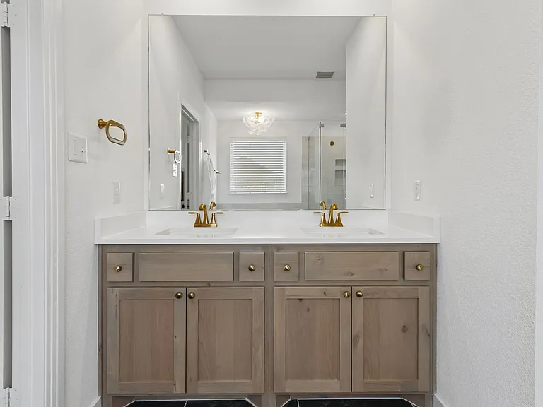Primary Bathroom with double sinks, spacious shower and soaking tub.