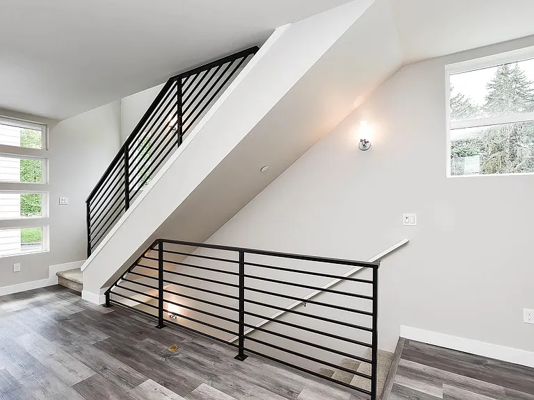 Modern design with engineered hardwood flooring.