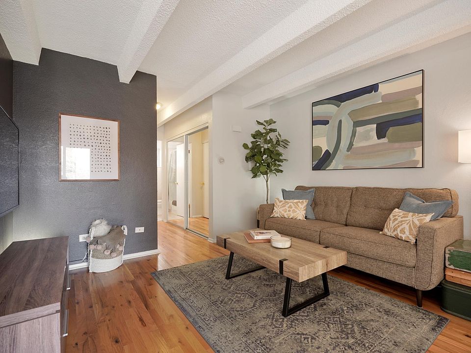 Hardwood floors, new paint, and comfortable furniture.