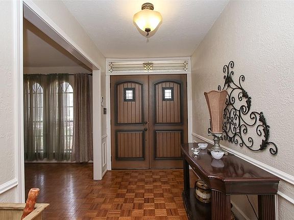 Both of these beautiful doors open to making moving your furniture in super easy!